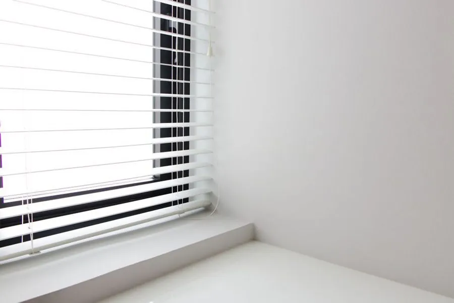 Clean internal window reveal and sill detail after bay window replacement