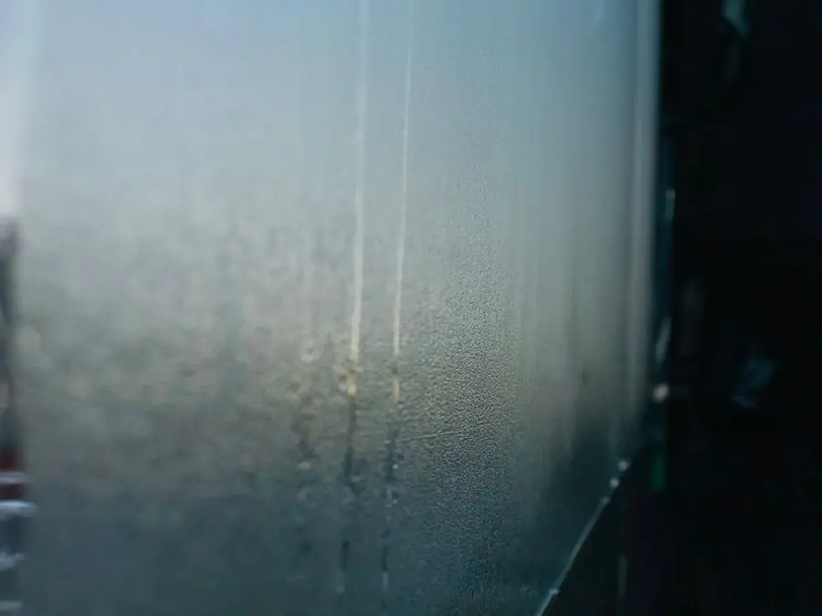 Condensation misting between glass panes showing a failed double glazing seal