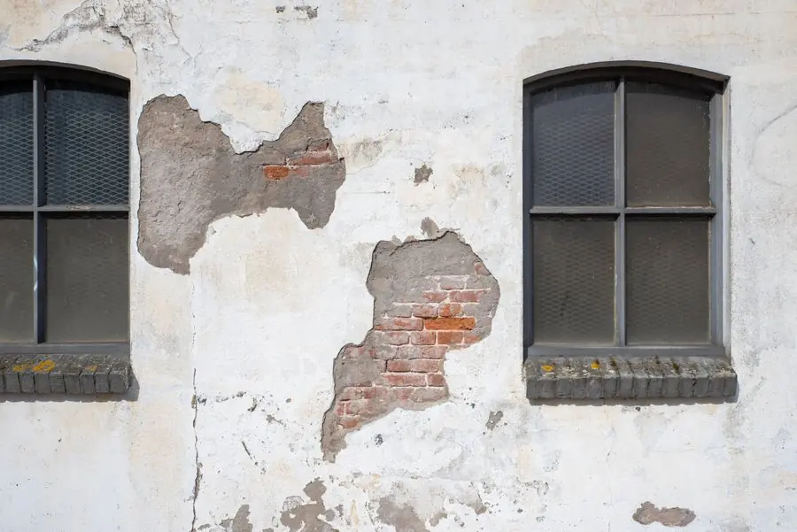 uPVC window frame showing weathering and age - double glazing lifespan in Devon's wet climate