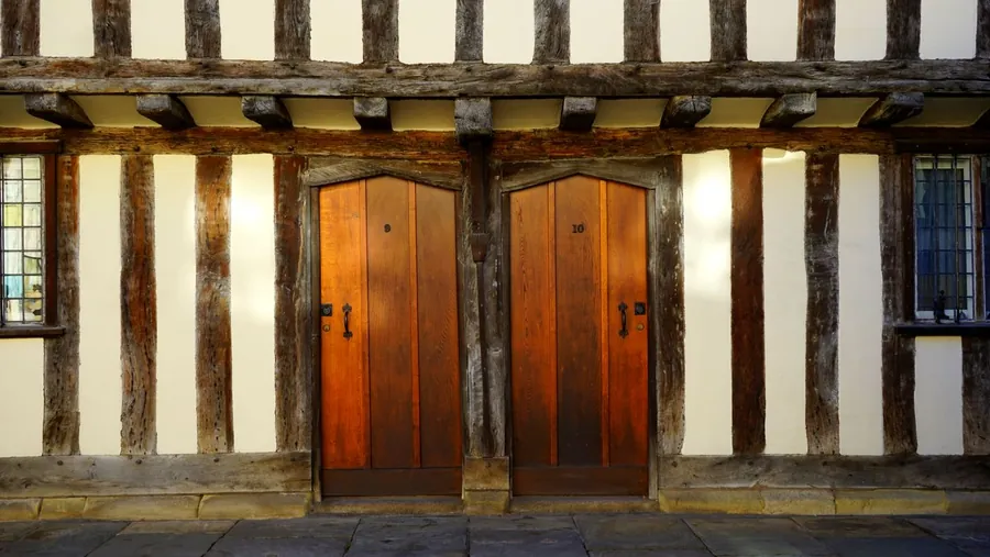 Traditional English timber framed doorway, an example of frame materials used on period porches