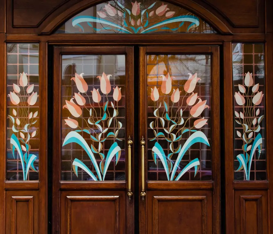 Glazed entrance door with decorative side panels, the critical locations where safety glass is required in a porch