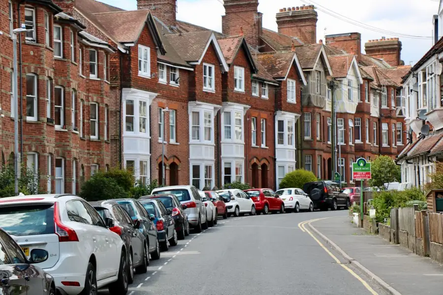 Victorian terraced street in Exeter with bay windows and replacement glazing