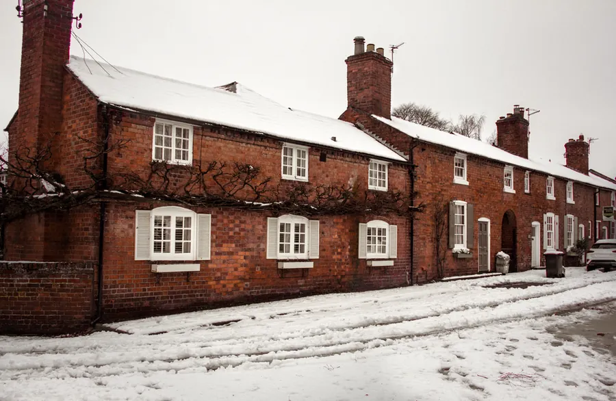 Frosty winter morning on a brick terraced street of the kind found across Exeter