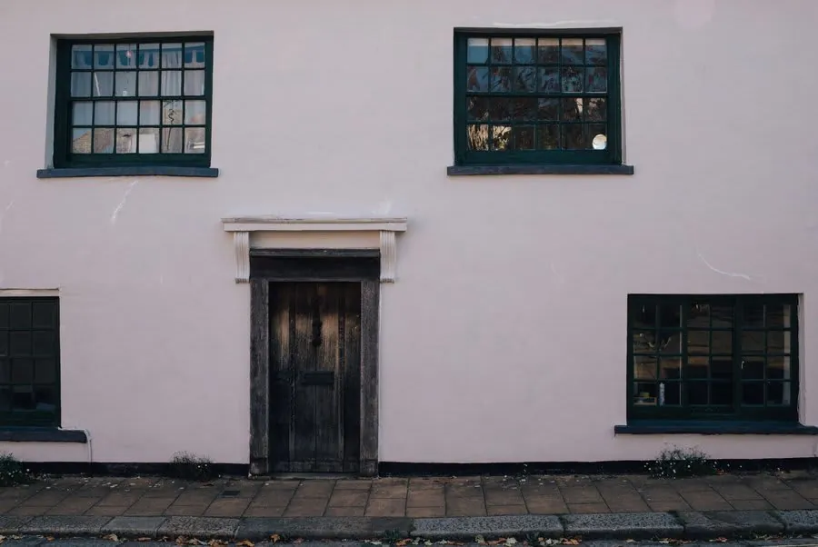 Close-up of anthracite grey uPVC casement window frame on Exeter property