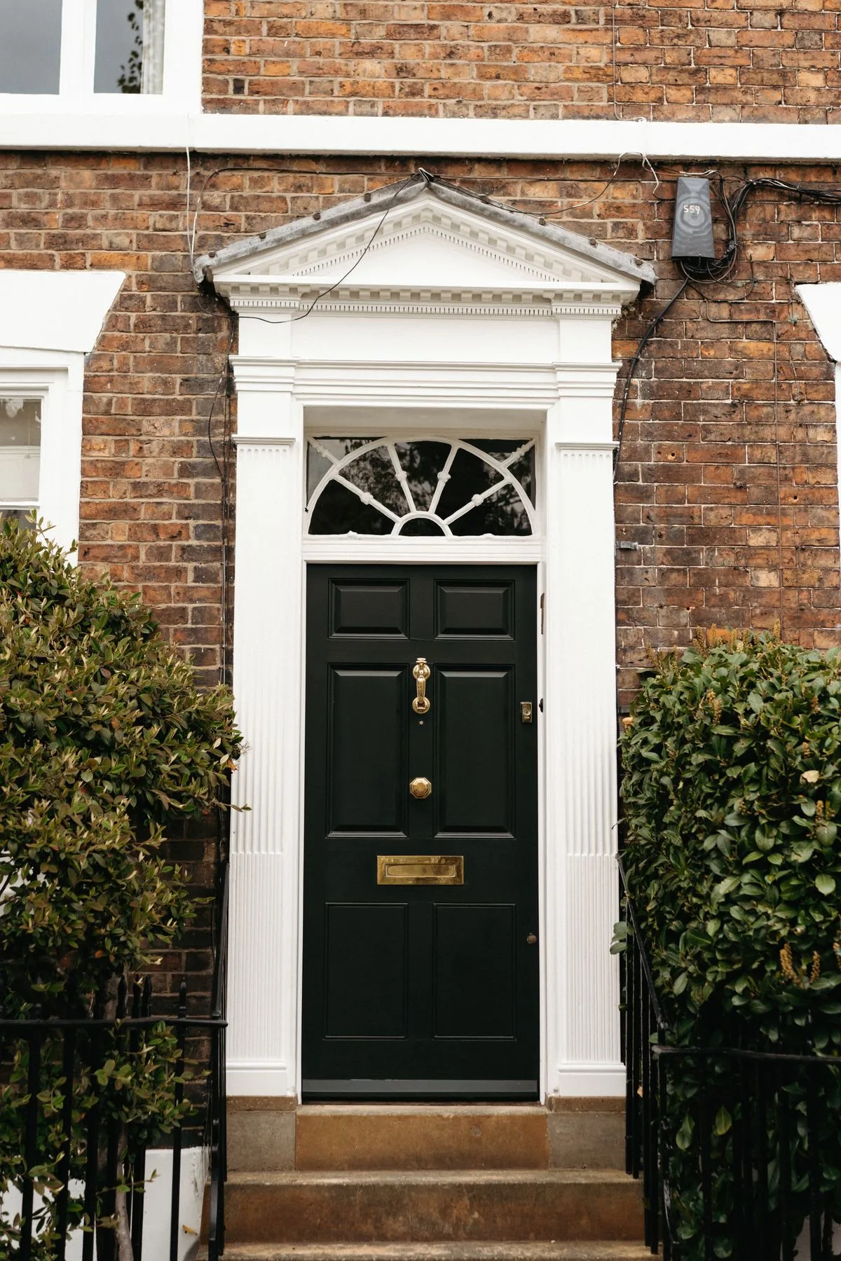 New black composite front door fitted on an Exeter property