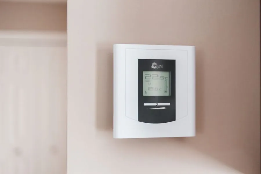 Smart thermostat showing home heating controls after window upgrade