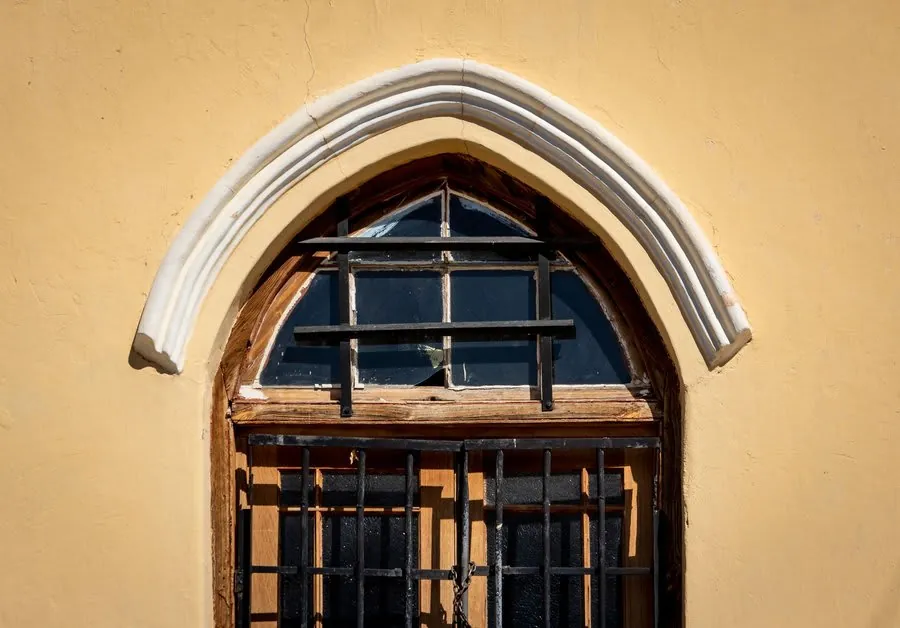 Modern replacement window with sandwiched Georgian bars fitted to Exeter property