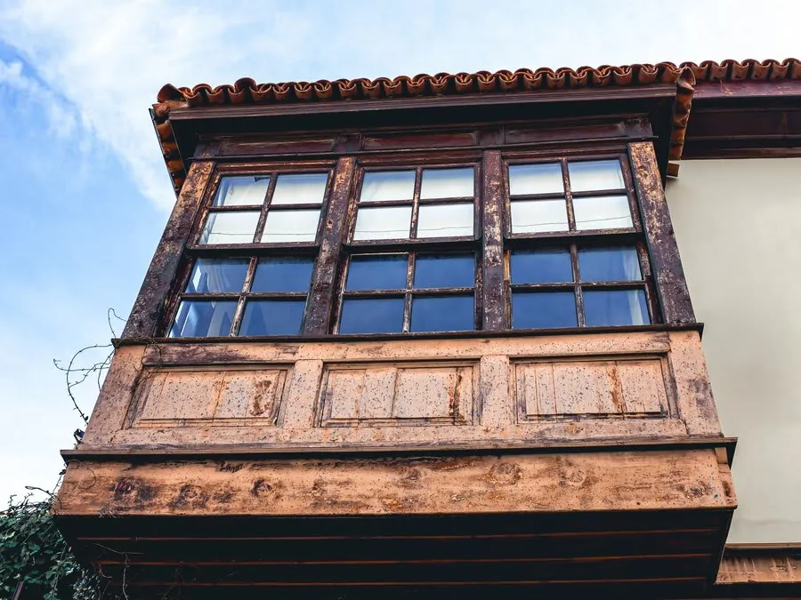 Heritage window timber frame restoration work on an Exeter listed building