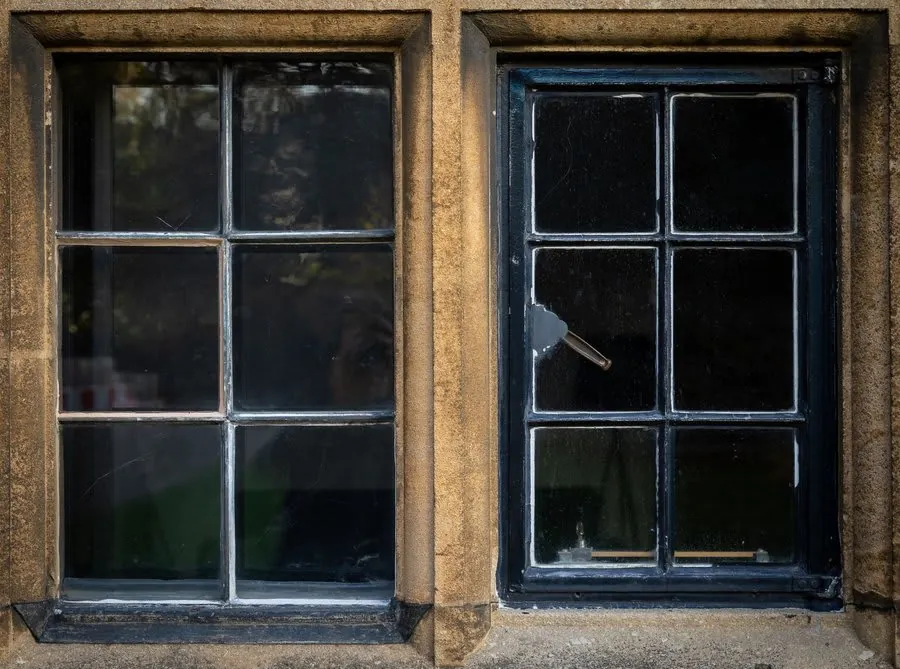 Window frame detail showing condition assessment for repair or replacement decision