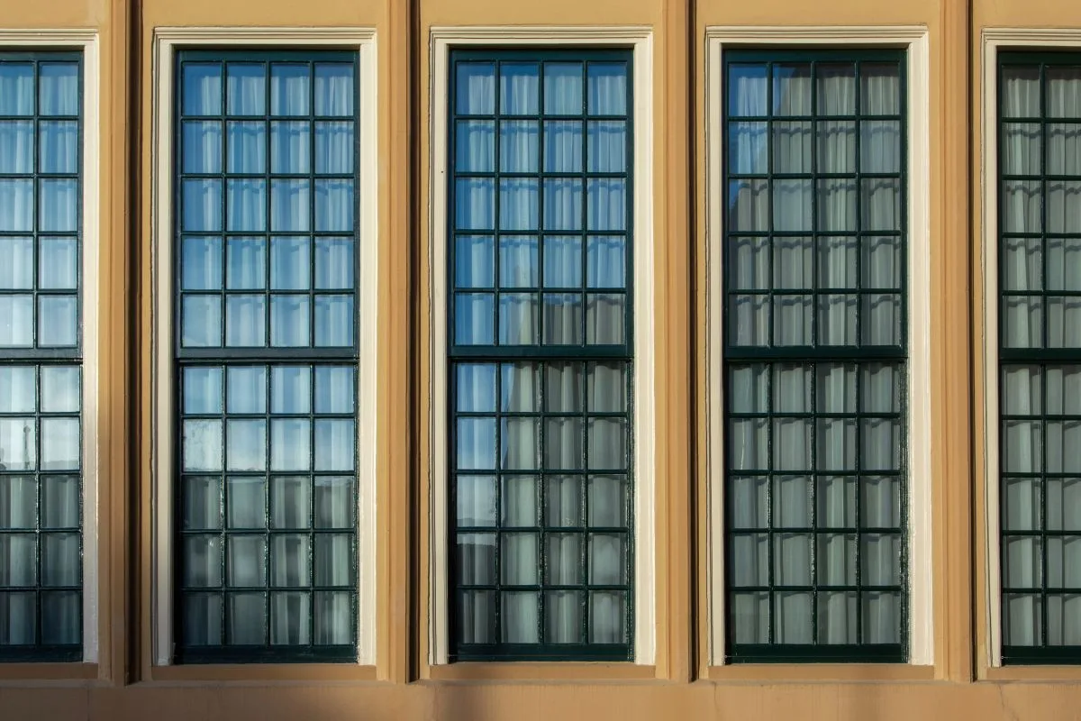 Tall classic woodgrain uPVC sash windows in Exeter