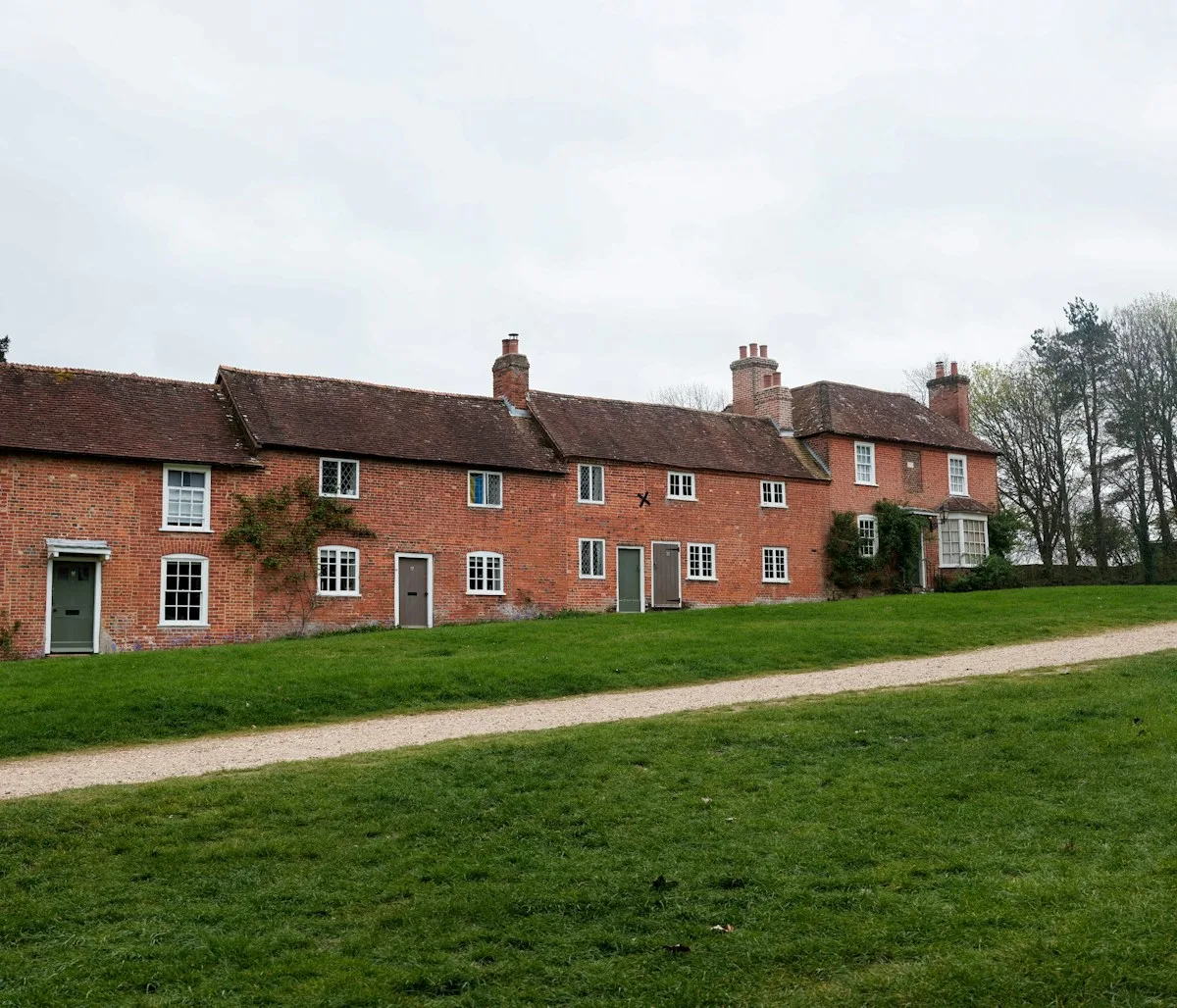 Row of traditional Exeter brick houses - window installation in Exeter