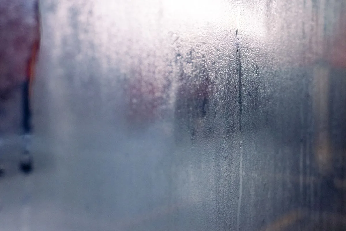 Foggy moisture on window glass - draughty window repair in Exeter