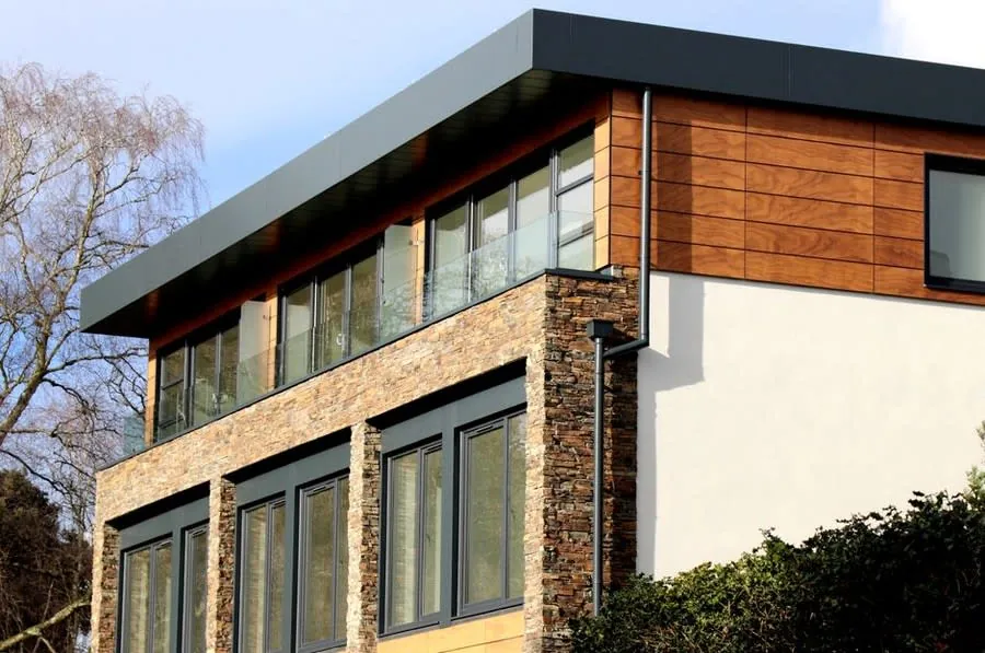 Contemporary house with slim grey aluminium windows near Exeter